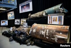FILE - A U.S. Department of Defense exhibit shows a Qiam short-range ballistic missile manufactured in Iran, at a military base in Washington, Nov. 29, 2018.