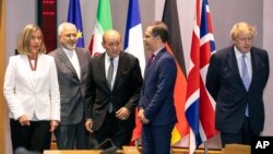 دیدار وزیر خارجه ایران با رئیس سیاست خارجی اتحادیه اروپا و همتایان بریتانیایی، فرانسوی و آلمانی خود در بروکسل - ۱۵ مه ۲۰۱۸