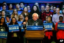 Democratic presidential candidate Sen. Bernie Sanders of Vermont addresses the crowd at a campaign rally at the University of Wisconsin-Eau Claire, April 2, 2016.