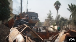 လေကြောင်းတိုက်ခိုက်မှုကြောင့် Mosul မြို့ကအပျက်အစီးများ