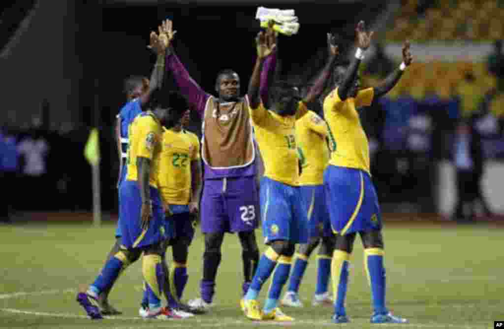 Gabon's players acknowledge their supporters after losing in the penalty shootout of their African Cup of Nations quarter-final soccer match against Mali at the Stade De L'Amitie Stadium in Gabon's capital Libreville, February 5, 2012.