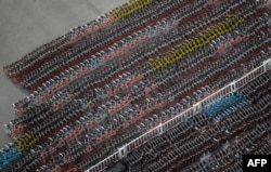 Impounded bicycles from the bike-sharing schemes Mobike and Ofo are seen in Shanghai, China.