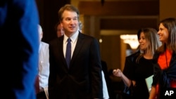 Supreme Court nominee Brett Kavanaugh leaves a meeting with Senate Majority Leader Mitch McConnell, R-Ky., on Capitol Hill, July 11, 2018.