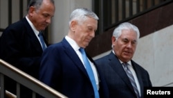 Secretary of Defense James Mattis and Secretary of State Rex Tillerson arrive to brief the Senate Foreign Relations Committee on Capitol Hill in Washington, Aug. 2, 2017.