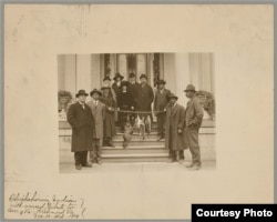 Chickahominy tribe paying annual tribute of game animals to Virginia governor, Dec. 10, 1919, a ceremony still observed today. Then-chief Ozias Westmore Adkins (third from left) served as chief from 1918 until his death in 1939. BAE 1-9 01787700, Nationa