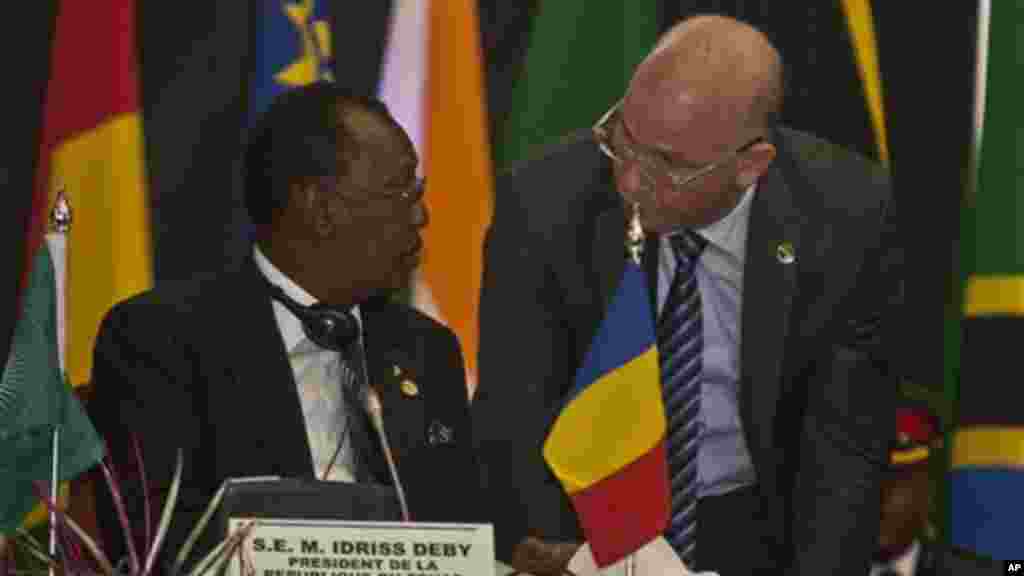 President of Chad, Idriss Deby, left, with Ambassador Smail Chergui, Comissioner Peace and Security African Union Commission, right, during the AU Summit, Sept. 2, 2014, in Nairobi, Kenya.