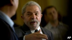 FILE - Brazil's former president Luiz Inacio Lula da Silva speaks during a press conference in Rio de Janeiro, Brazil, Dec. 3, 2015.