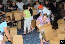 Up to 160 Jacob's Light" volunteers help with packing and shipping the overseas-bound "care" packages every month