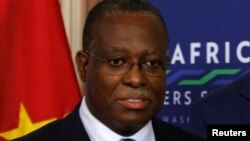 FILE - Vice President of Angola Manuel Vicente at the State Department in Washington, Aug. 4, 2014. Vicente is suspected of bribing a Portuguese magistrate to favor him in two investigations, a statement said. It said Vicente was at the time of the alleged crimes the head of Angolan state oil company Sonangol.
