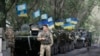 Ukraine Government Calls on Rebels to Disarm
