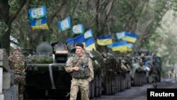 우크라이나 정부군이 8일 동부 슬로비얀스크 지역에 주둔하고 있다.