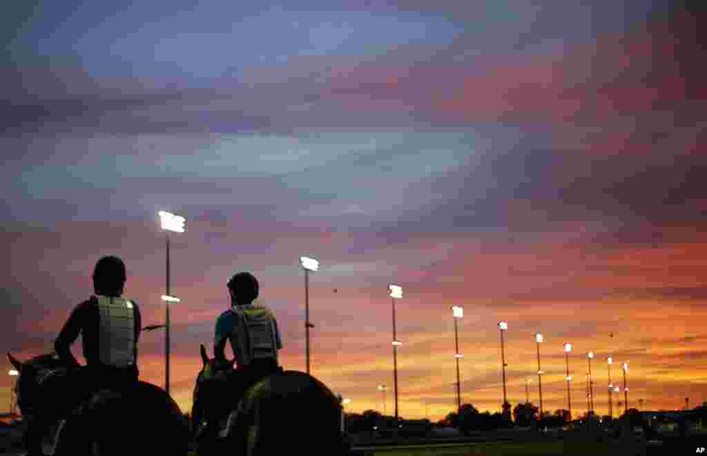 Riders get ready for their morning workouts at Churchill Downs in Louisville, Kentucky, USA. 