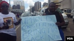 Jestina Mukoko engaging in street protest.
