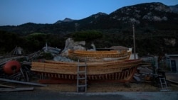 Wooden boats at Agios Isidoros boat building area on the eastern Aegean island of Samos, Greece, on Wednesday, June 9, 2021. (AP Photo/Petros Giannakouris)