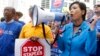 U.S. Congresswoman Judy Chu (D-Calif.) joins U.S. Post Office employees during a protest outside a Staples store on April 24, 2014 in Los Angeles. 