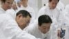 Japan's New PM Greets Workers at Fukushima Nuclear Plant