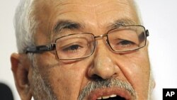 The leader and founder of the moderate Islamic party Ennahda, Rachid Ghannouchi, addresses the media during a press conference held in Tunis, October 28, 2011.