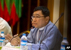 Win Myat Aye, Myanmar's social welfare minister, who is leading the repatriation process, talks to journalists during a press briefing, April. 19, 2018, in Yangon, Myanmar.