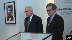 David Rubenstein of the Carlyle Group, left, and James Basker, Gilder Lehrman Institute of American History, during the introduction of the copy of the 13th Amendment signed by President Abraham Lincoln, at the New York Historical Society, New York, Febru