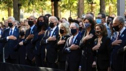 From left, former President Bill Clinton, Hillary Clinton, former President Barack Obama, Michelle Obama, President Joe Biden, first lady Jill Biden and others are pictured at the National 9/11 Memorial and Museum, Sept. 11, 2021, in New York.