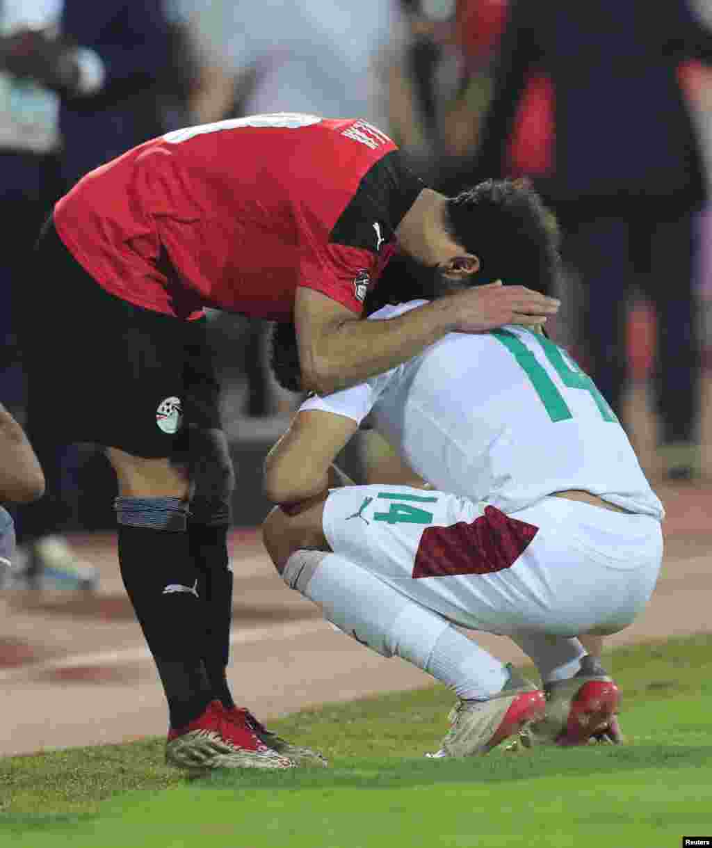 Egypt&#39;s Mohamed Salah consoles Morocco&#39;s Zakaria Aboukhlal after the match in Cameroon, Jan. 30, 2022.