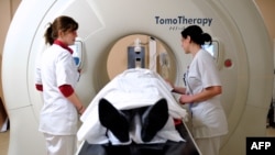 Patient preparing to undergo a tomotherapy rays treatment, at the Oscar Lambret Center in Lille, northern France. (File Photo)