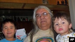 Storyteller and grandfather John Bevis with two of his grandsons -- Payton Sinclair, 6, and Quintin Sinclair, 2. Bevis lives and tells stories on the Umatilla Reservation near Pendleton, Oregon.