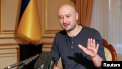 Russian journalist and Kremlin critic Arkady Babchenko speaks during an interview with foreign media in Kyiv, Ukraine, May 31, 2018.