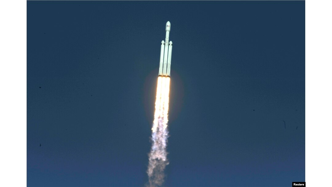 A SpaceX Falcon Heavy rocket lifts off from historic launch pad 39-A at the Kennedy Space Center in Cape Canaveral, Florida, Feb. 6, 2018.