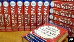 FILE - Merriam-Webster's Collegiate Dictionary are seen at the company's headquarters office in Springfield, Mass.,