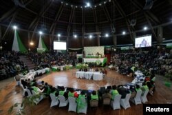 FILE - The Kenyan Independent Electoral and Boundaries Commission prepares to announce election results at the Bomas of Kenya, in Nairobi, Aug. 11, 2017.