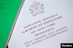 A Pope Francis document, known as an apostolic exhortation, entitled Gaudete et exsultate (Rejoice and be glad), is seen in this picture illustration taken at the Vatican, April 9, 2018.
