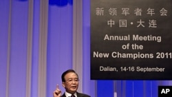 Chinese Premier Wen Jiabao speaks at World Economic Forum at the Dalian World Expo Center in Dalian, in northeast China's Liaoning Province, September 14, 2011.