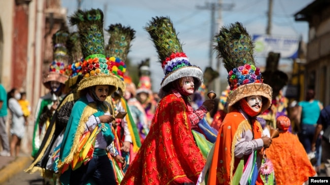 Parishioners take part in El Gueguense, a satircal drama and an expression of protest against the colonial rule to mark the Feast of Saint Sebastian, in Diriamba, Nicaragua January 19, 2022.