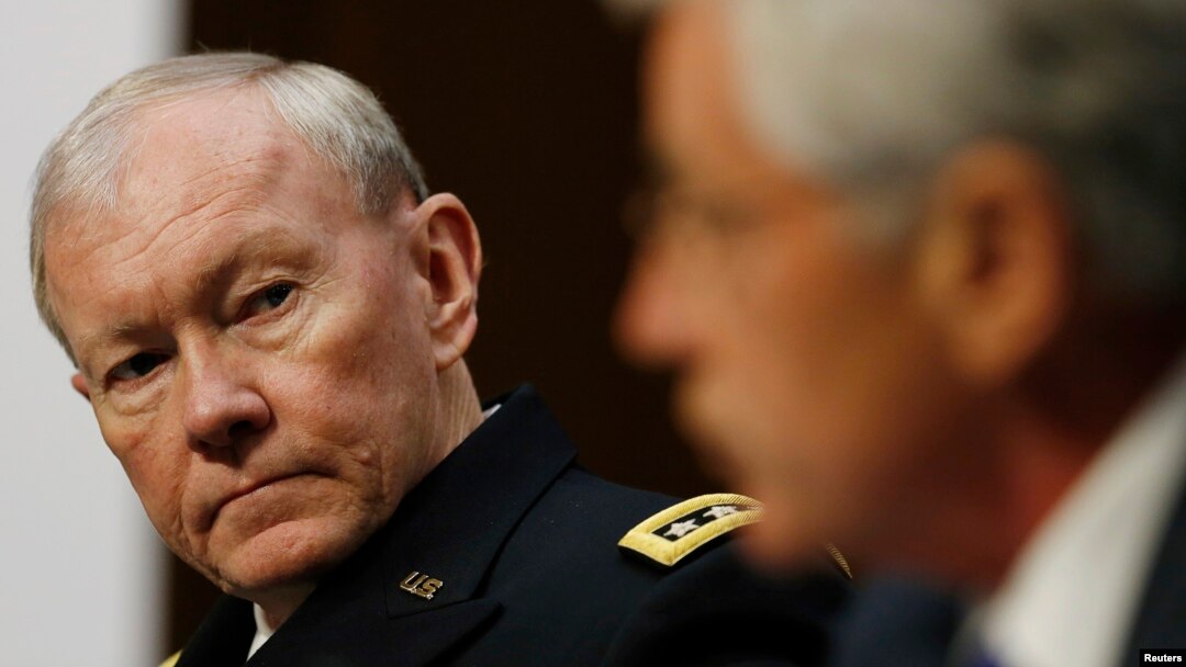 U.S. Secretary of Defense Chuck Hagel (R) and Chairman of the Joint Chiefs of Staff U.S. Army General Martin Dempsey (L) testify before the Senate Armed Services Committee on Capitol Hill in Washington, March 5, 2014.
