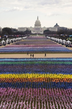 The "Field of Flags" and the U.S. Capitol building are seen ahead of inauguration ceremonies for President-elect Joe Biden in Washington, U.S., January 20, 2021. (REUTERS/Allison Shelley)