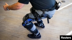 Keith Maxwell, Senior Product Manager of Exoskeleton Technologies at Lockheed Martin, demonstrates an Exoskeleton during a Exoskeleton demonstration and discussion, in Washington, U.S., November 29, 2018. REUTERS/Al Drago