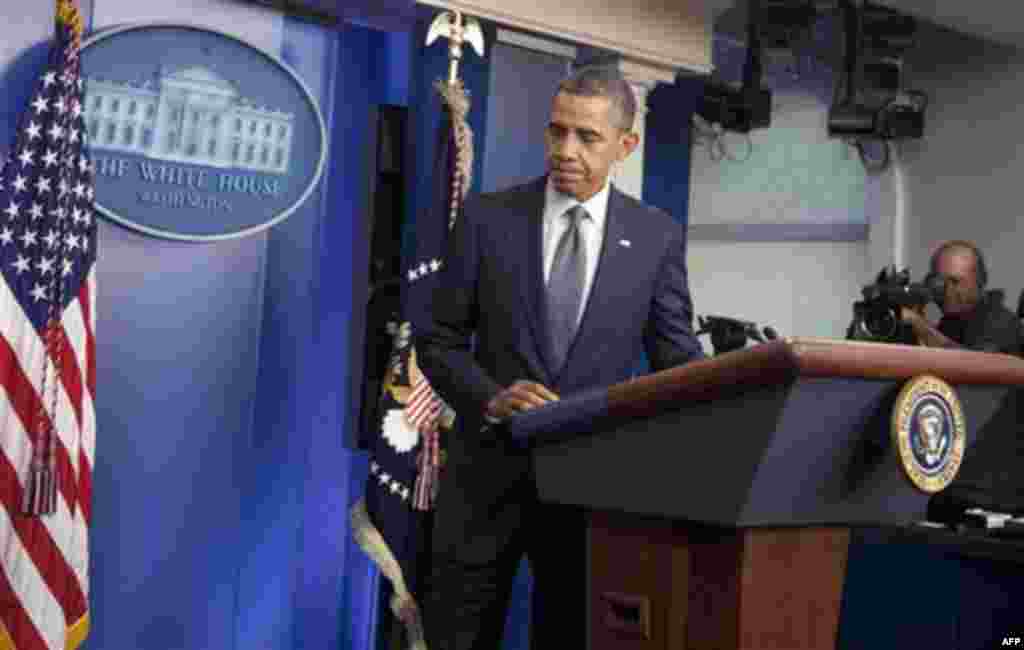 President Barack Obama leaves after speaking in the briefing room of the White House in Washington, Friday, Oct. 21, 2011, where he declared an end to the Iraq war, one of the longest and most divisive conflicts in U.S. history, announcing that all U.S. t