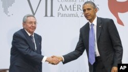 FILE - President Barack Obama and Cuban President Raul Castro meet for an informal talk on the sidelines of the Summit of the Americas in Panama City, April 11, 2015. 