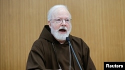 FILE - U.S. Cardinal Sean O'Malley speaks during a seminar at the Pontifical Gregorian University in Rome, March 23, 2017.