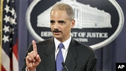 Attorney General Eric Holder answers a question about WikiLeaks during a news conference at the Justice Department in Washington, 29 Nov 2010