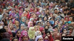 Kashmiri women attend the funeral of Sajad Ahmad Bhat, a suspected Lashkar-e-Taiba militant, on the outskirts of Srinagar, India, Jan. 12, 2016. 