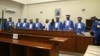 Congolese Judges of the Constitutional Court stand to leave after addressing the court session where they confirmed Felix Tshisekedi's victory in the presidential election in Kinshasa, Democratic Republic of Congo, Jan. 20, 2019. 