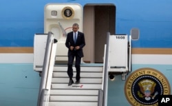 U.S. President Barack Obama arrives at Melsbroek military airport in Melsbroek, Belgium, June 4, 2014.