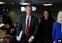 FILE - Billionaire activist Tom Steyer walks from the podium after speaking at a news conference in Washington, Jan. 8, 2018.