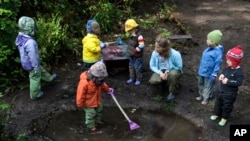 Cedarsong Nature School is an outdoor preschool on Vashon Island near Seattle, Washington. Students at the three-hour-a-day school spend the entire time outside, no matter what the weather brings. (AP Photo/Ted S. Warren, 2010)