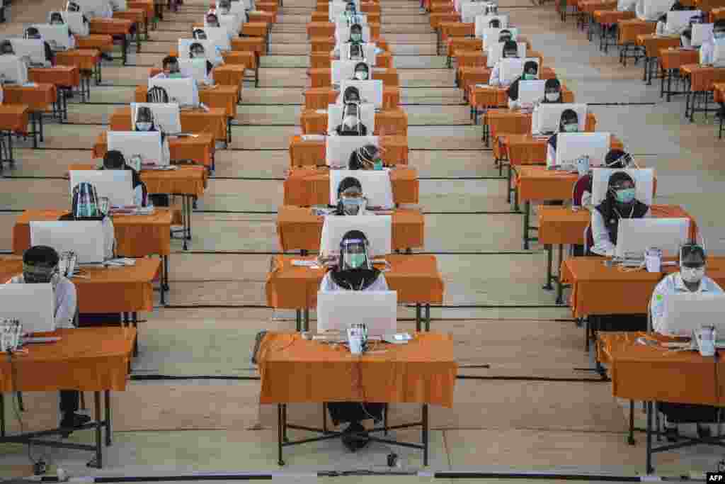 State civil employee candidates take a test in Surabaya, Indonesia.