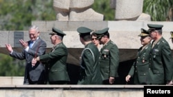 U.S. Secretary of Defense James Mattis walks with Brazilian military officers during a visit to the Monument to the Dead of World War II, Rio de Janeiro, Brazil, Aug.14, 2018. 