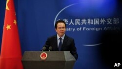 China's Foreign Ministry spokesman Hong Lei is seen during a daily briefing at the ministry in Beijing, China, April 5, 2016. Speaking on Sandy Phan-Gillis' case, Hong has called for China's judicial sovereignty to be respected.