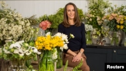 Florist Philippa Craddock, who has been chosen to create the floral displays for the wedding of Prince Harry and Meghan Markle, poses for a photograph in her studio in London, March 29, 2018.